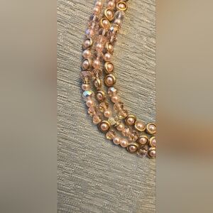 Adjustable triple strand blush pearl and iridescent bead fashion necklace